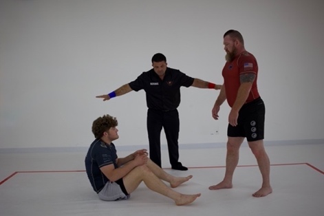 Interrupting the competition gesture